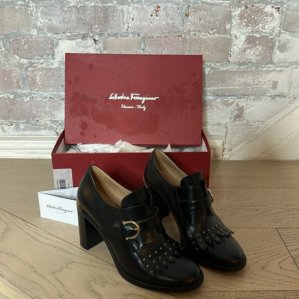 Salvatore Ferragamo leather fringe trim, buckled heeled boots